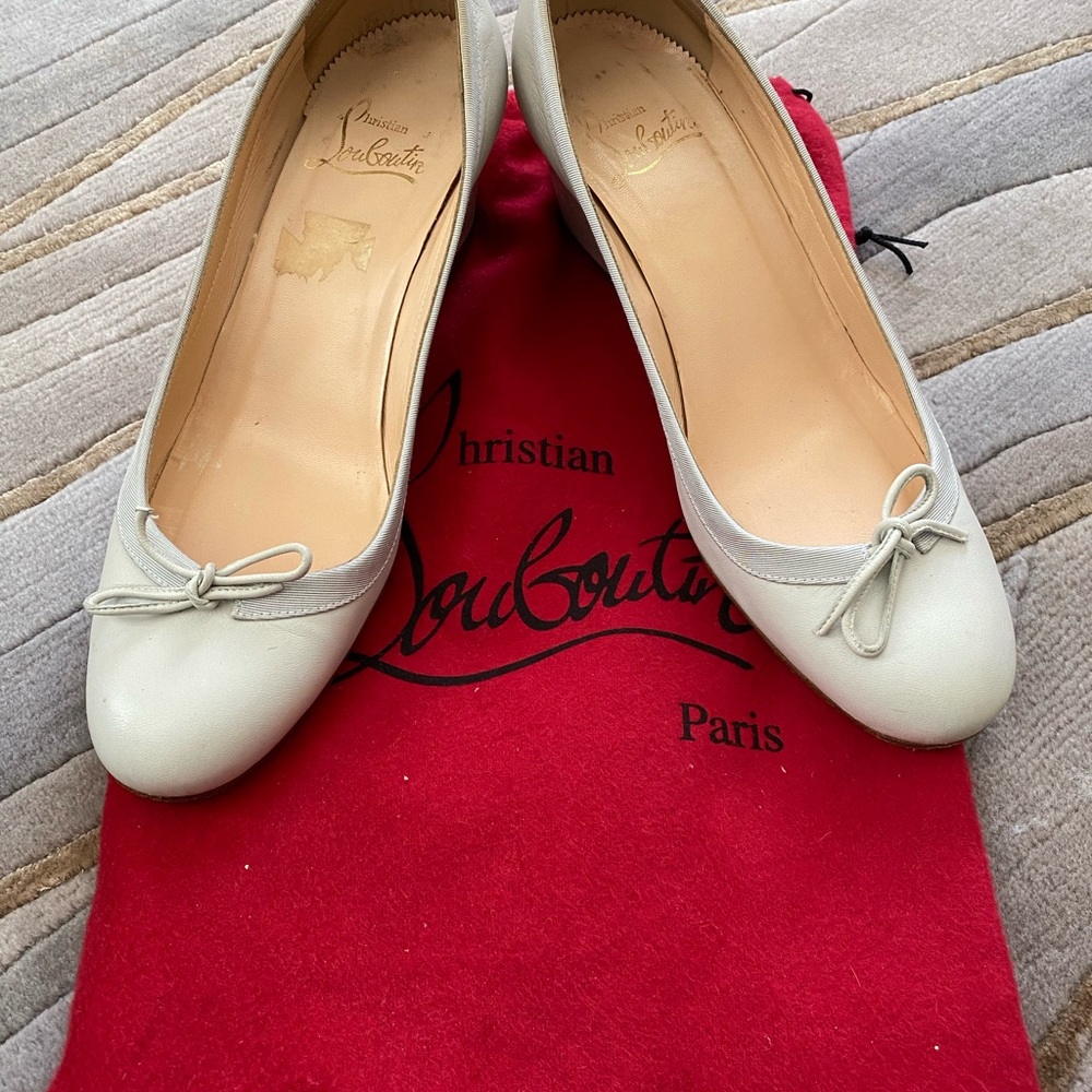 - Christian Louboutin wedges